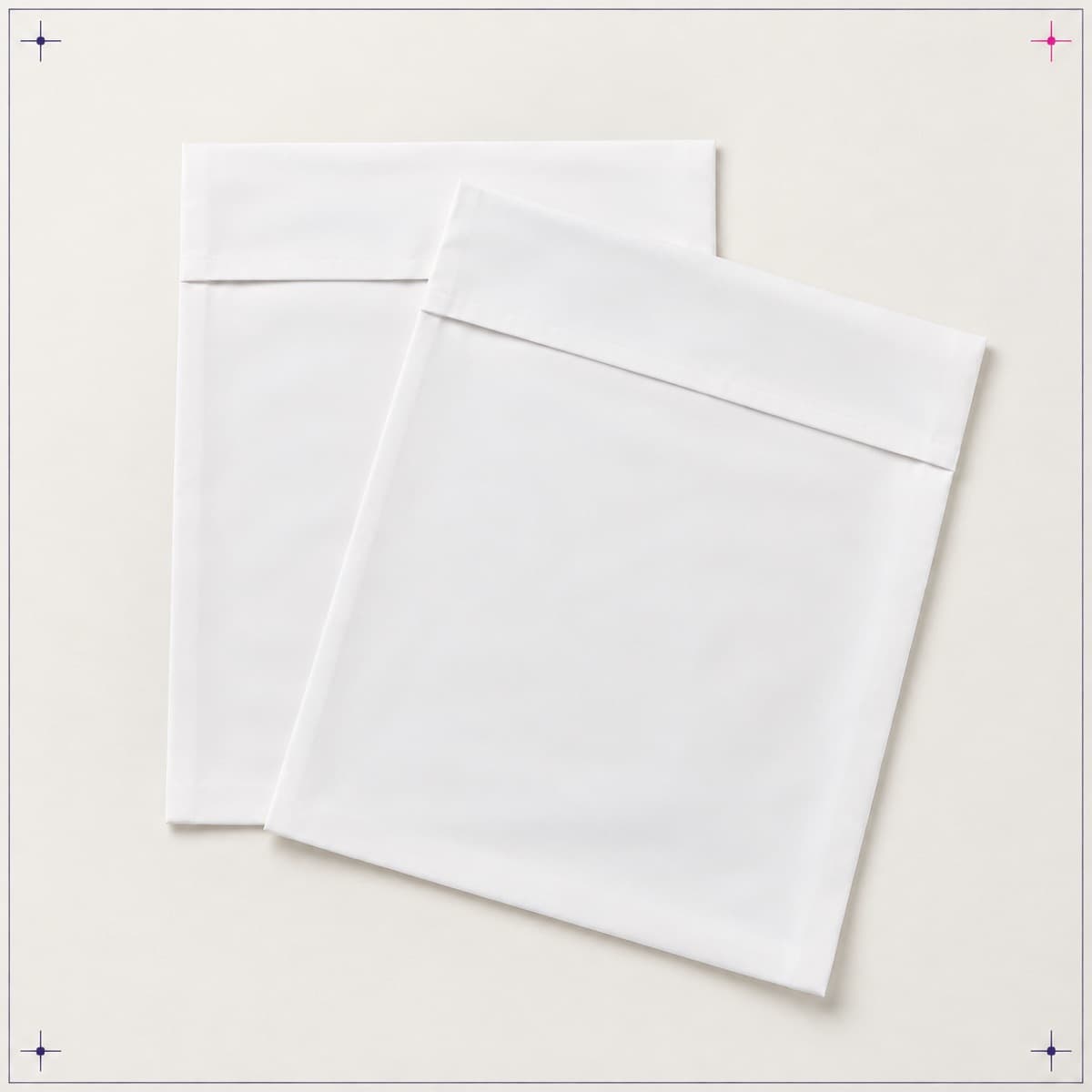 Pillowcase Pair, an unprinted 100% polyester microfibre blank photographed flat on almond paper.
