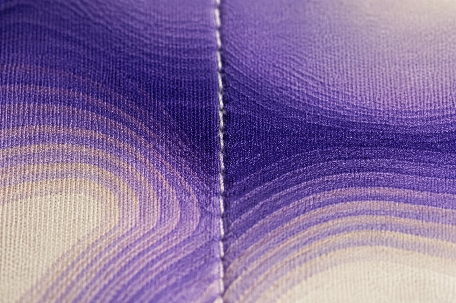 Macro photograph illustrating panel-cut printing on polyester.